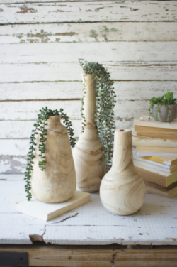 Set Of Three Hand-Carved Tall Wooden Bottles